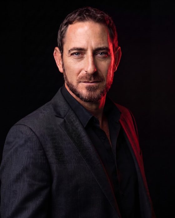 Portrait of Uri Samet, founder and CEO of Buzz Dealer